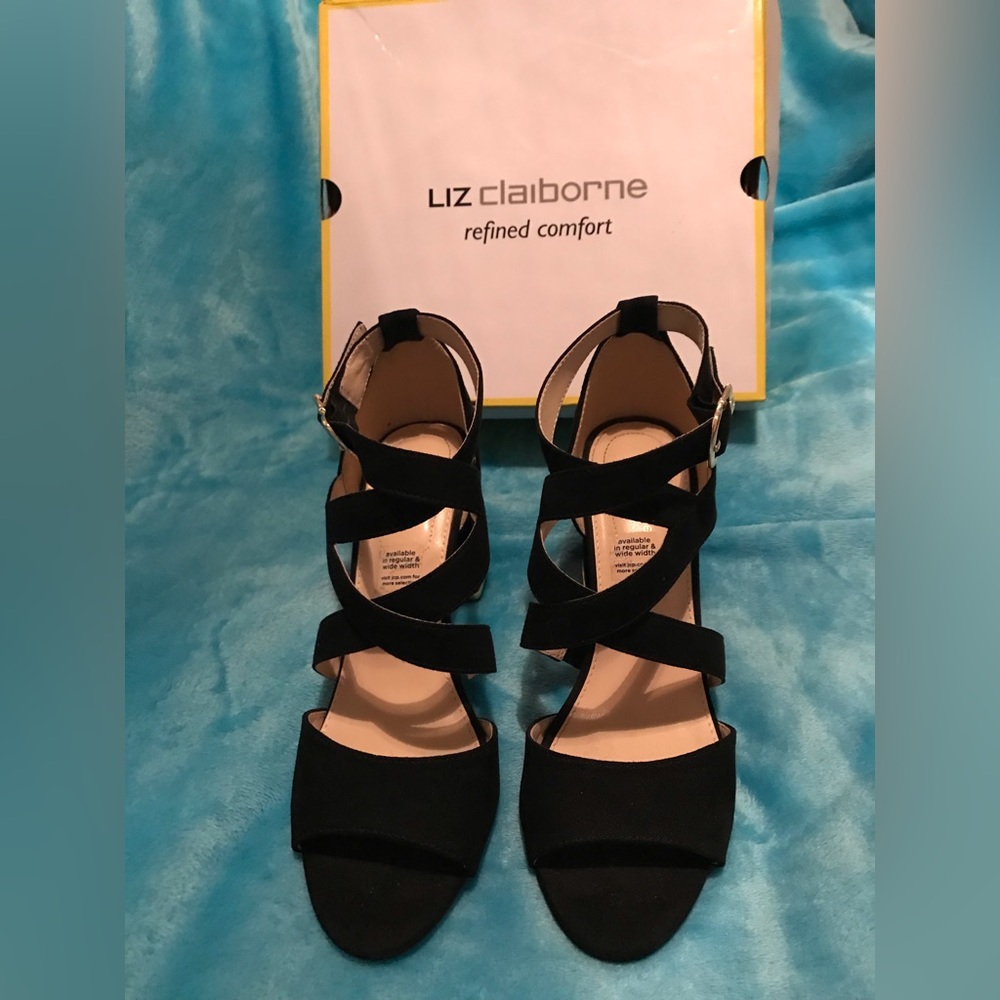 Black chunky heel with gold on the shoe.